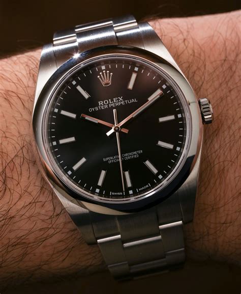 rolex oyster perpetual 39 black review|rolex 114300.